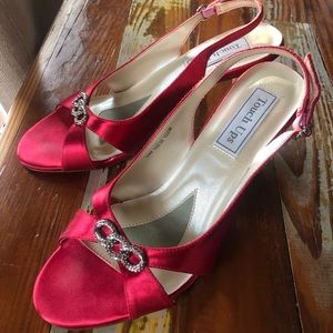 Red satin open toe shoes